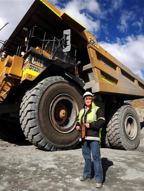 Lynne Ward provides a soft touch to driving her monster 120-tonne dump truck at OceanaGold's...