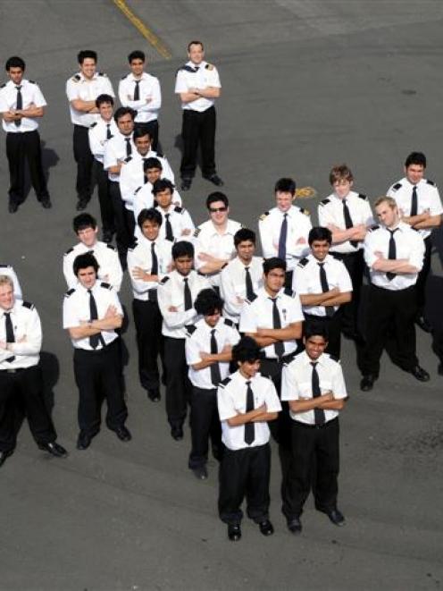 Mainland Aviation College students and college manager John Penno (front, right) at Dunedin...