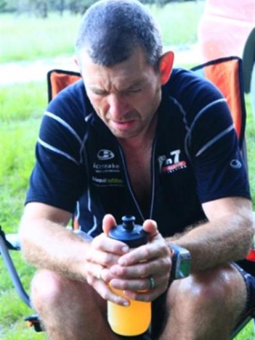 Mal Law enjoys a sit down and a cold drink after completing the Rees Dart circuit on day 5.