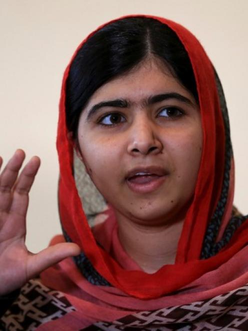 Malala Yousafzai speaks during a meeting with the leaders of the #BringBackOurGirls Abuja...