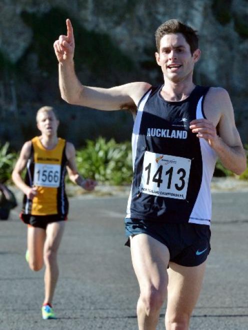 Malcolm Hicks (Auckland) celebrates as he crosses the line ahead of Benjamin Ashkettle ...