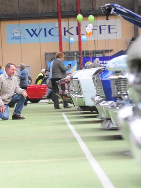 Malcolm Mouat, of Dunedin, checks out a display of Ford Falcons at the Sunnyvale Contracting...