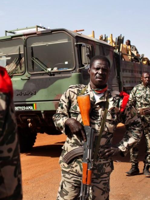 Malian soldiers heading to Gao arrive in the recently liberated town of Douentza. REUTERS/Joe Penney