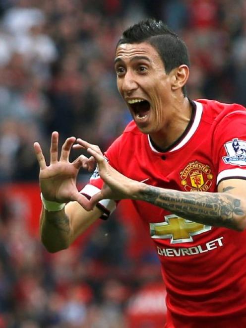 Manchester United's Angel Di Maria celebrates after scoring against Queens Park Rangers. REUTERS...