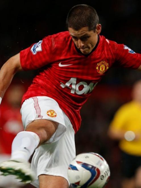 Manchester United's Javier Hernandez shoots at goal during their English League Cup match against...