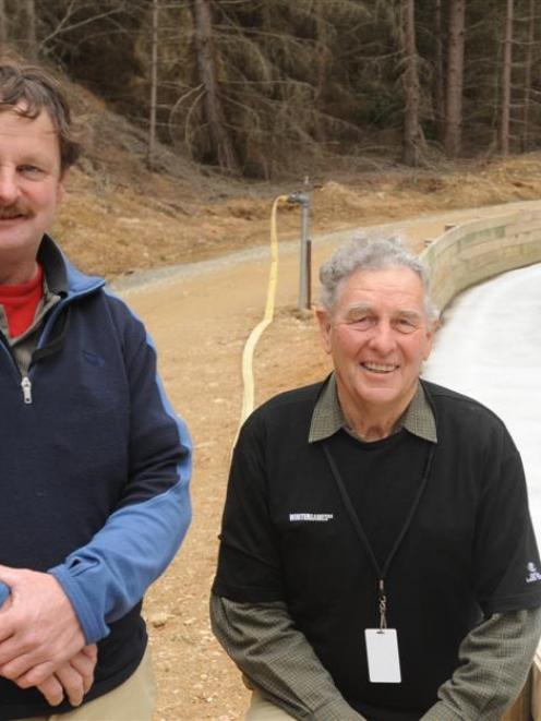 Maniototo Winter Sports officials David Greer (left) and Gerald Dowling inspect the luge course...
