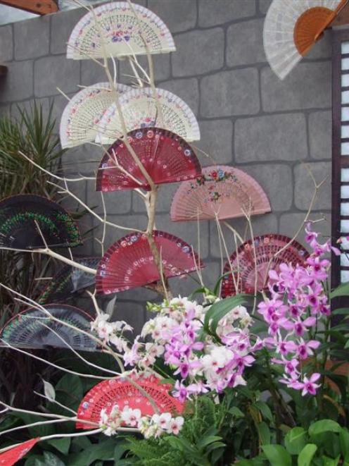 Many of the national displays used orchids but few as effectively as the Philippines, which...