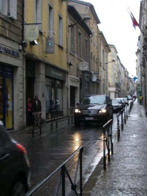 Many roads in France, like this one in Carcassonne, were not built originally for cars. Photo by...