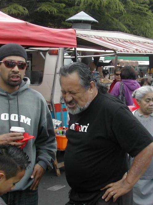 Maori Party co-leader Pita Sharples (centre) meets supporters at the Otara flea market in...