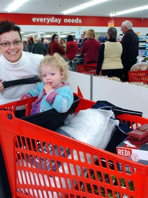 Maree Darling and daughter Summer (23 months) visit the new Warehouse store in Mosgiel yesterday....