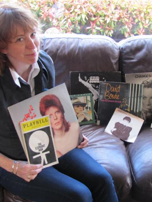 Margaret O'Hanlon displays her Bowie collection, holding 
...