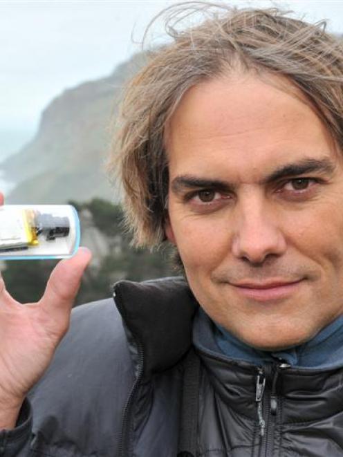 Marine scientist Dr Thomas Mattern, at Boulder Beach, with one of his innovative video cameras...