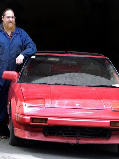 Mark Baxter with his recovered Toyota MR2. Photo by Jane Dawber.