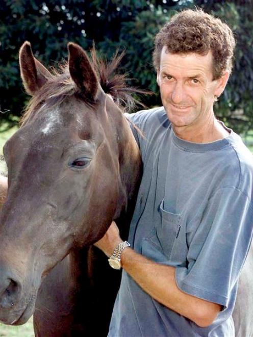 Mark Todd and Charisma at Todd's Cambridge stud in 2001.