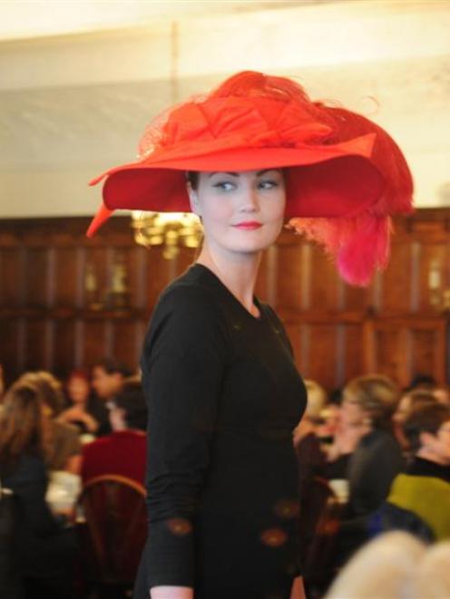 Marte Kristensen models a hat from the last 100 years at the Zonta Metropolitan Dunedin club's...