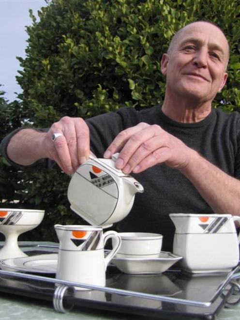 Martin McPherson makes a cup of tea with his Art Deco empire ware tea set as he settles into his...