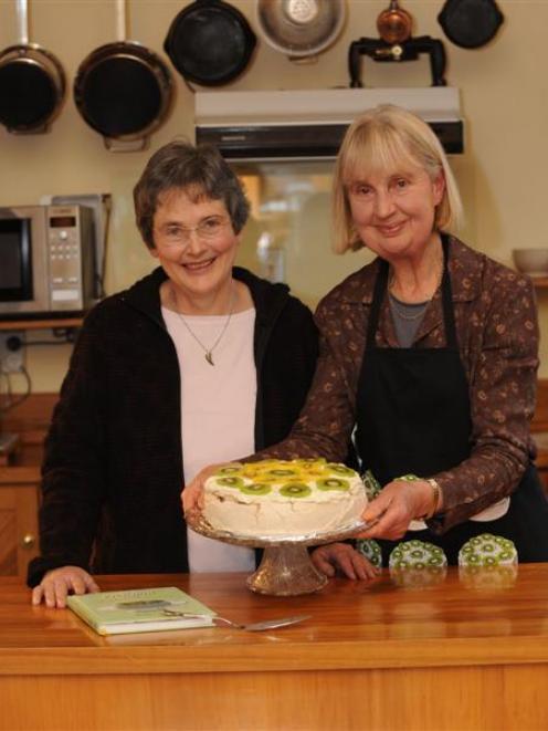 Mary Browne and Helen Leach show off their fail-safe pavlova. Photo by Peter McIntosh.
