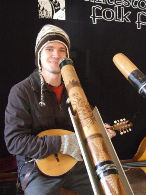 Matt Caradus, of Dunedin, can play both the didgeridoo and the mandolin at the same time. Photo...