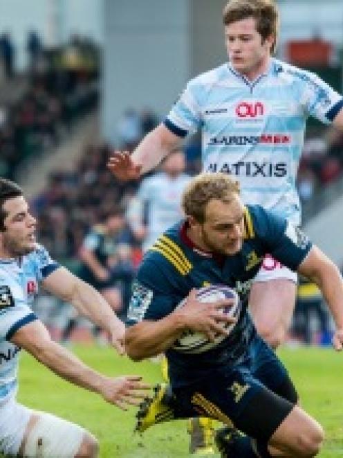 Matt Faddes of Pulse Energy Highlanders scores a try against Racing 92 during the Natixis Rugby...
