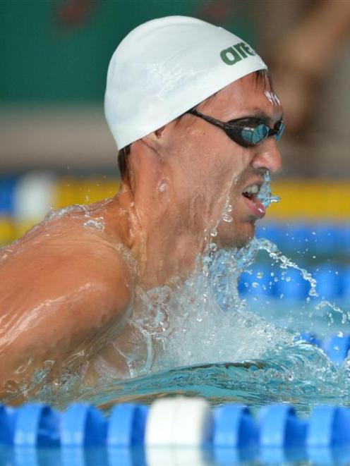 Matthew Glassford competes in the men's 17 and over 100m breaststroke at Moana Pool yesterday....