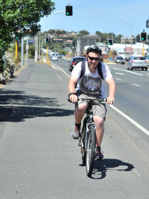 Matthias Rades (17), of Dunedin, cycles towards the city along the Portsmouth Dr shared path...