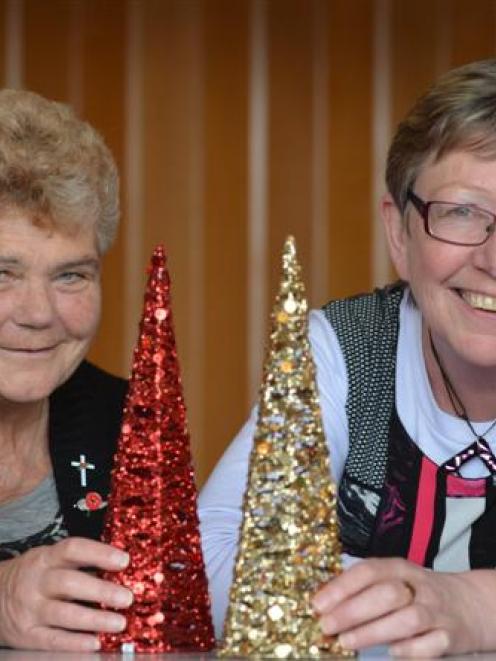 Maureen  McKay (left) and Joy Davies  are preparing for East Taieri Church's fifth  Christmas day...