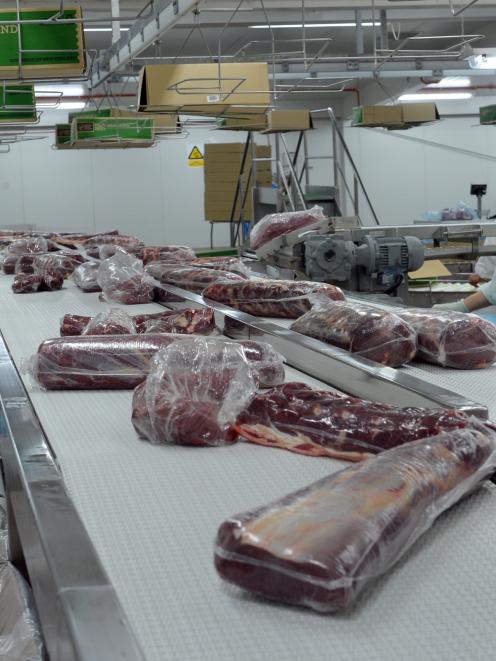 Meat being packaged ready for export at Silver Fern Farms' Finegand plant. Photo by Stephen...