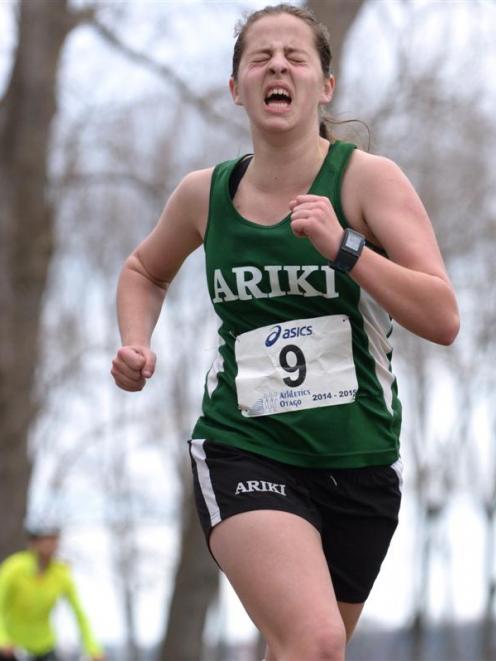 Melissa Halley wrings out the last of her reserves to sprint for the line and win the Port road...