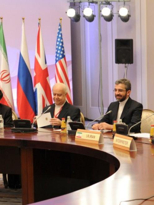 Members of the Iranian delegation, led by Supreme National Security Council Secretary and chief...