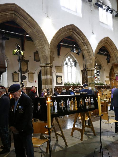 Members of the public view the coffin of King Richard III in Leicester Cathedral, central England...