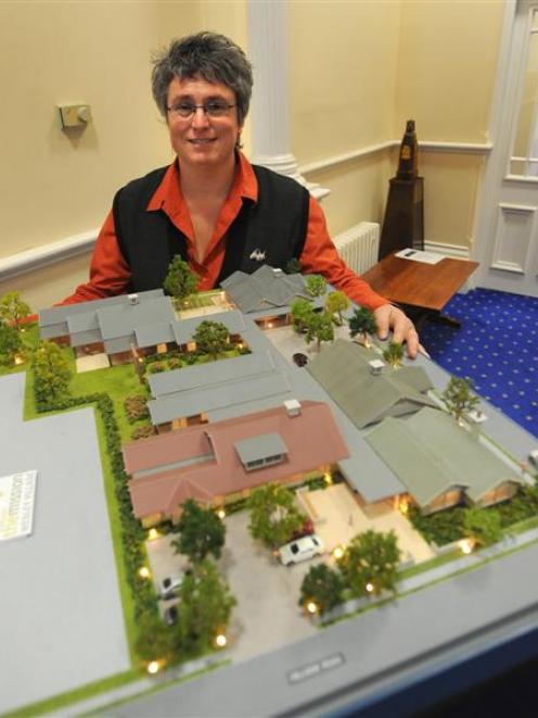 Methodist Mission chief executive Laura Black with a model of the mission's proposed social...