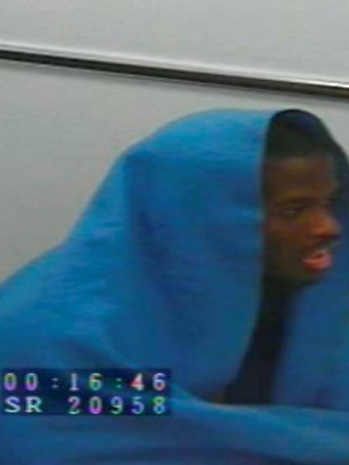 Michael Adebolajo is seen during a police interview in this still image taken from CCTV footage....
