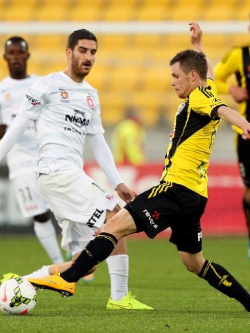 Michael McGlinchey of the Phoenix controls the ball during his side's round five A-League match...
