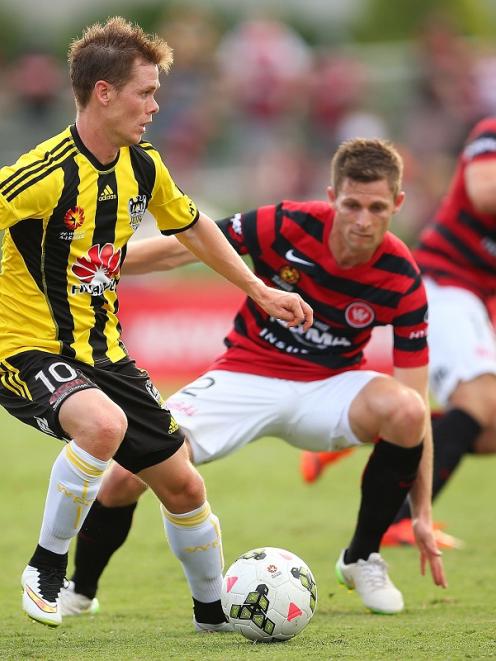 Michael McGlinchey of the Phoenix controls the ball during the match against Western Sydney....