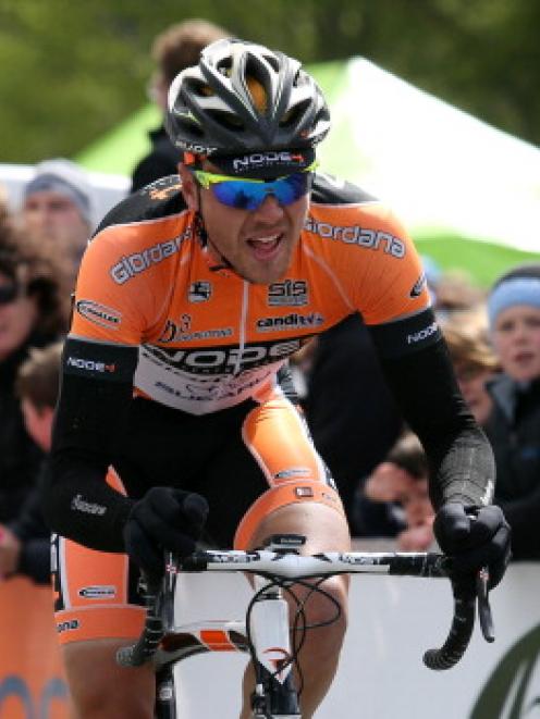 Michael Northey crosses the finish line to win the 2012 Tour of Southland. (Photo by Rob...