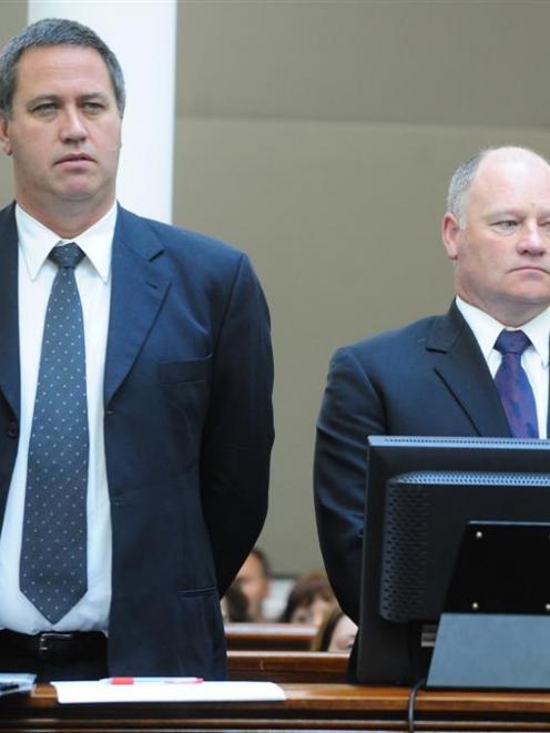 Michael Swann (left) and business associate Kerry Harford appear in the High Court in Dunedin at...