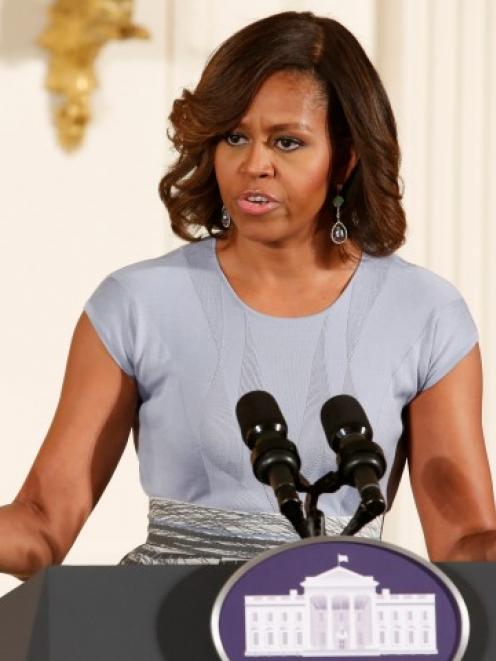 Michelle Obama: 'In these girls, Barack and I see our own daughters. We see their hopes, their...