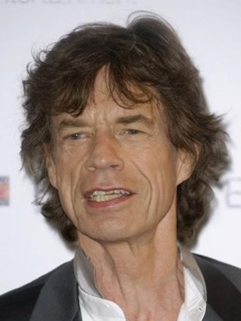 Mick Jagger poses during a photo call for the film "Stones in Exile" at the 63rd international...