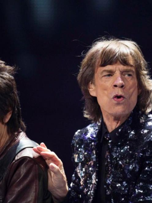 Mick Jagger (R) and Ronnie Wood of The Rolling Stones perform at the Barclays Center in New York...