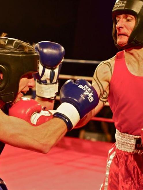 Middleweight boxers Dave "Hurricane Hedgehog" den Hertog (left) versus unanimous winner Brett ...