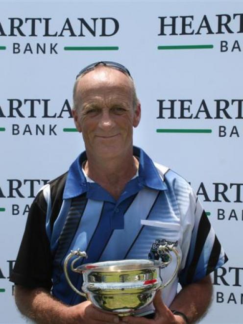 Mike Kernaghan with the singles  trophy yesterday. Photo by Bowls NZ.