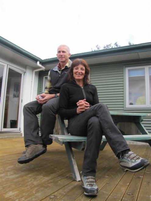 Mike Roberts and Lydia Bradey put their feet up in Wanaka after a frightening experience in...