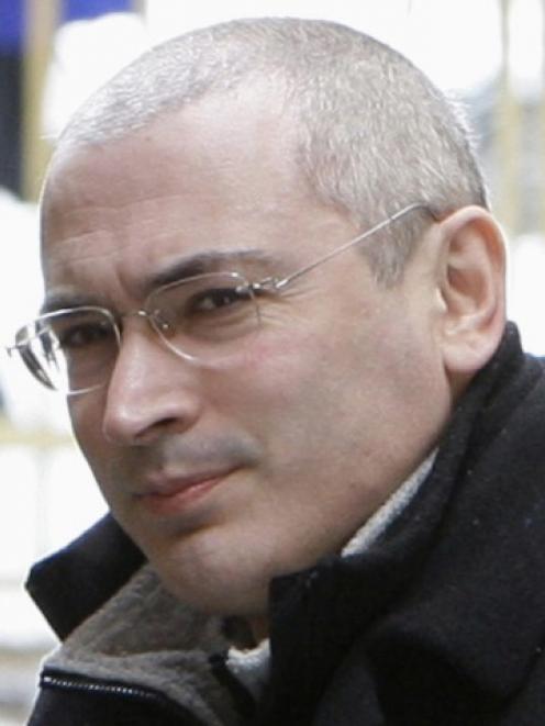 Mikhail Khodorkovsky arrives at a court building in Moscow in this March 2009 file photo. REUTERS...