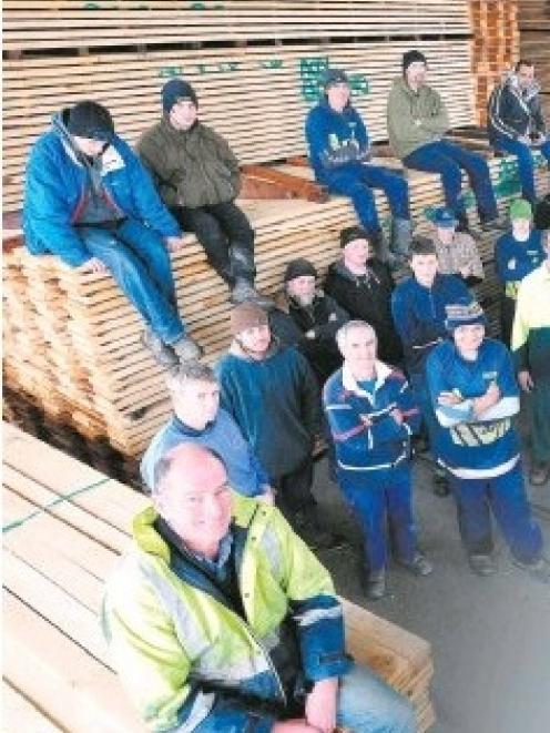 Millstream Lumber manager Murray Daniel (foreground) and his staff of about 50 employed at the...