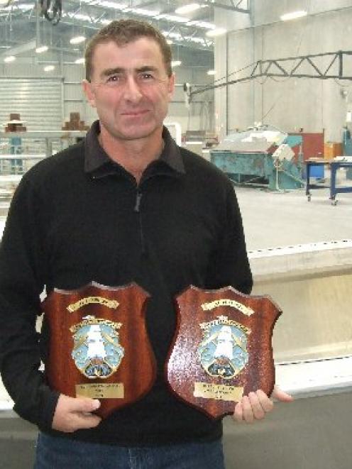 Milton boat-builder Steve McLay holds the trophies for best aluminium fishing boat open class and...