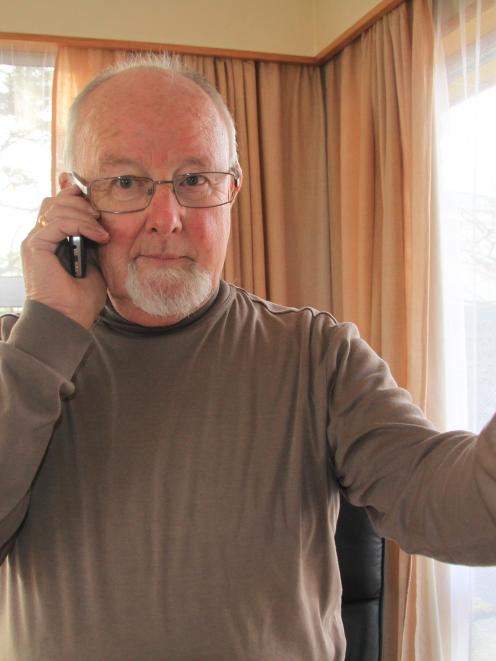 Milton man Martin Taylor feels he may be luckier than some to have access to a cellphone while...