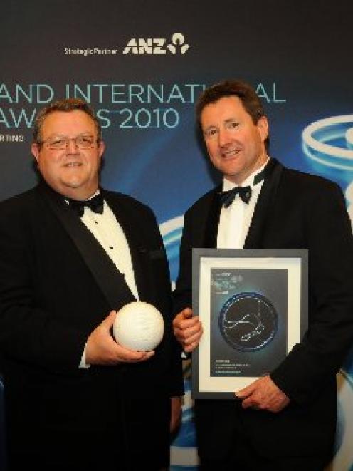 Minister for Economic Development Gerry Brownlee presents New Zealand Merino chief executive John...