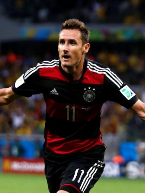 Miroslav Klose celebrates after scoring for Germany against Brazil in their World Cup semifinal...