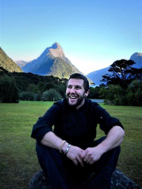 Mitre Peak Lodge head chef Craig Cooper with Mitre Peak in the background. Photo supplied.