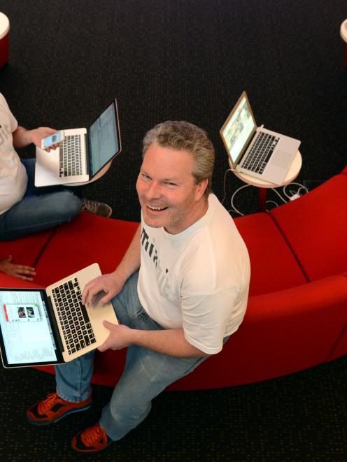 MixBit lead developer Joshua Garner (left) and developer George Sealy at work in the thriving IT...